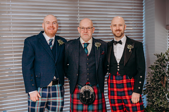 stuart and the boys at clare and stuarts wedding with the celebrant angel aberdeen